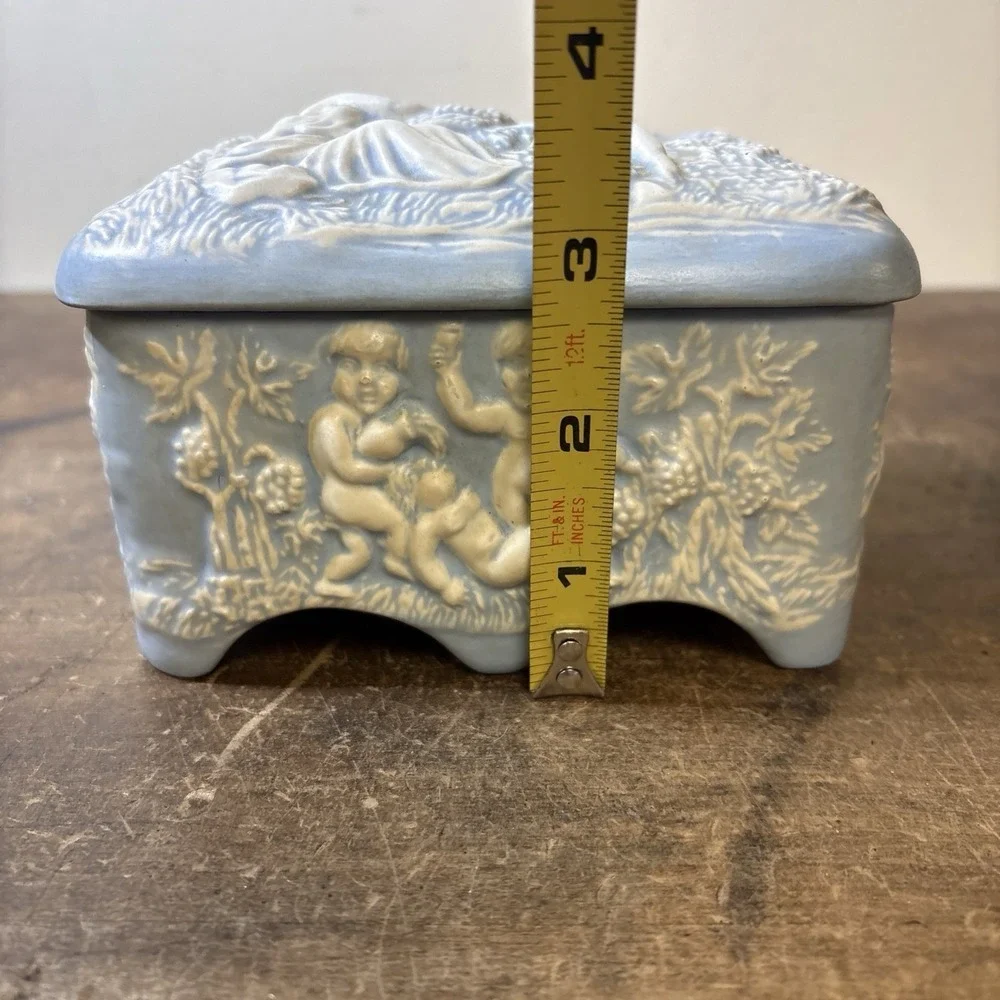 Vintage Blue & White Cherub Relief Music Box Trinket Jew Box Plays Music Footed